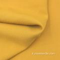 Tessuto per pantaloni giallo tinto in poliestere antirughe